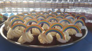 Rainbow Party Ideas Red velvet mini cupcakes with rainbows