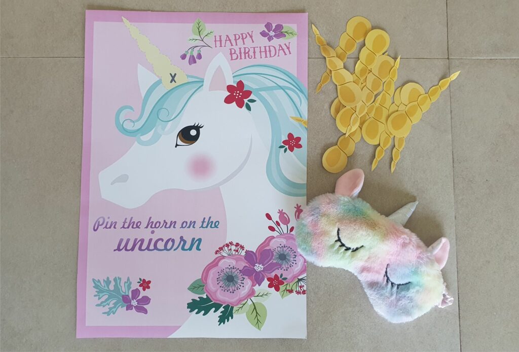 Pin the horn on the unicorm game unicorn party activity