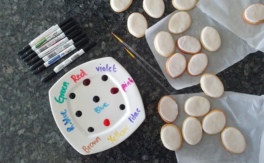 Cookie Painting with kids butter cookies with icing