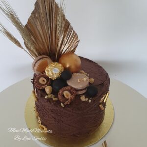 Ferrero Rocher Cake with stencilled buttercream and macarons Order customized cakes in Goa